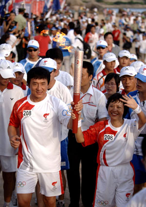 Jackie Chan carrying Olympic Torch