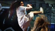 Andrea James Lui bad ass action movie chick in close space fight in Bail Enforcers