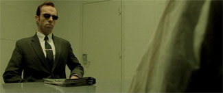 The Matrix movie Agent Smith at interrogation table