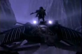 The Chronicles of Riddick with Riddick standing on top of the moving Merc Spaceship