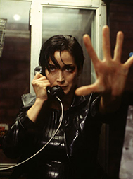 Trinity in the phone booth in The Matrix