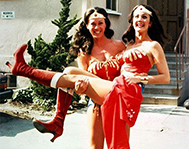 Jeannie Epper, Lynda Carter's Wonder Woman stunt double, holds her like a bride