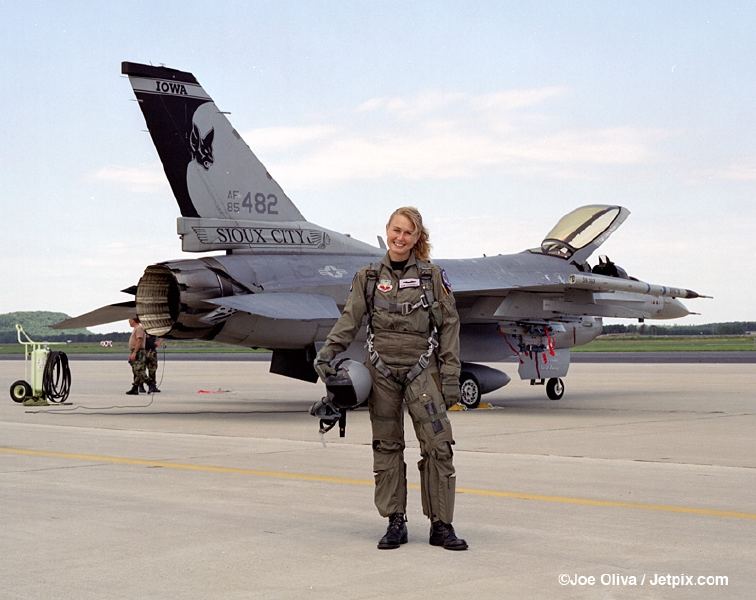 female fighter pilot in full gear